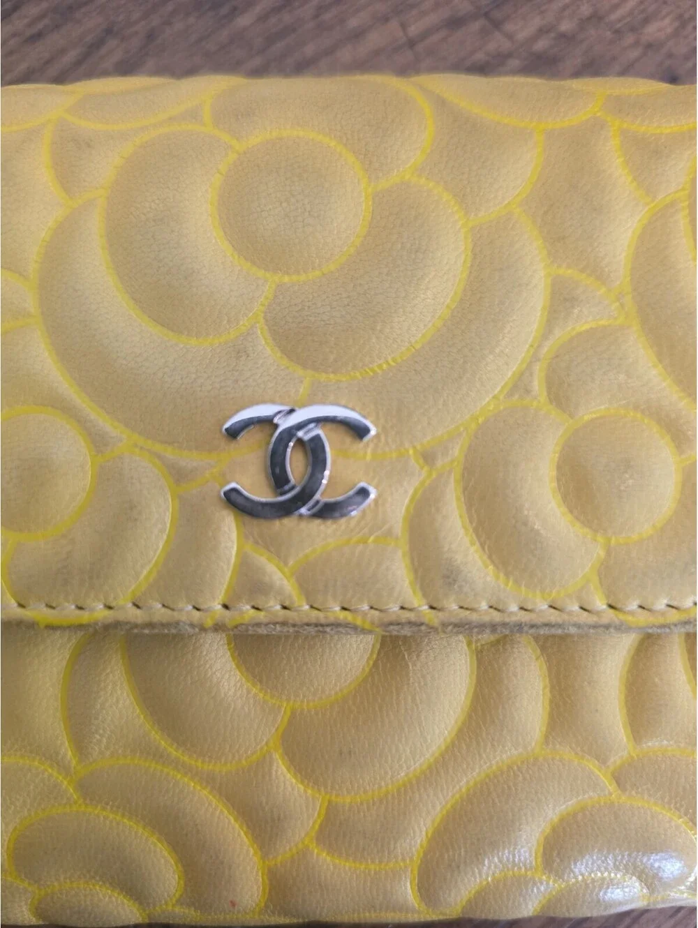 Authentic Chanel Camellia Embossed Yellow Lambskin w Chain